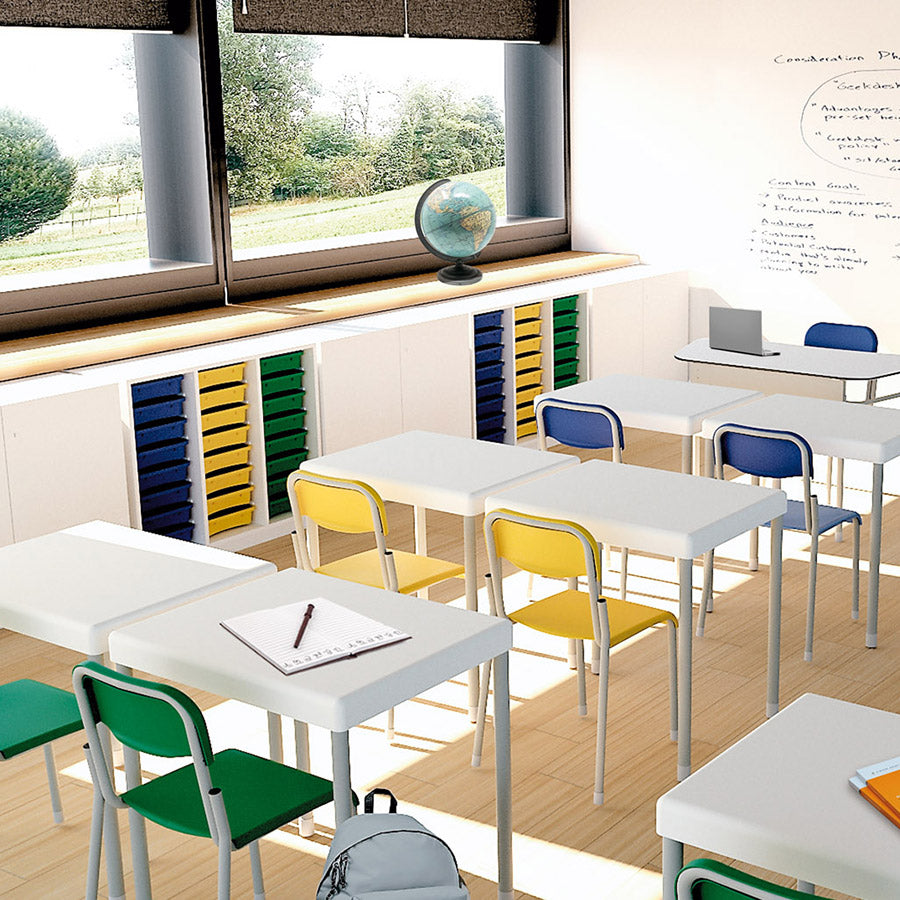 Mais 4 Leg AA06 Chair. Modern classroom with colourful desks and chairs, large window, and educational materials.