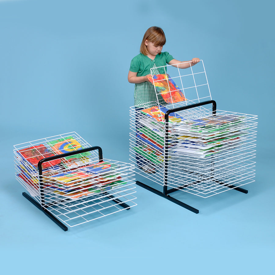 MD30130 and MD30131 Table Top Art Drying Rack 40 Shelf with girl demonstrating artwork and blue backdrop 1